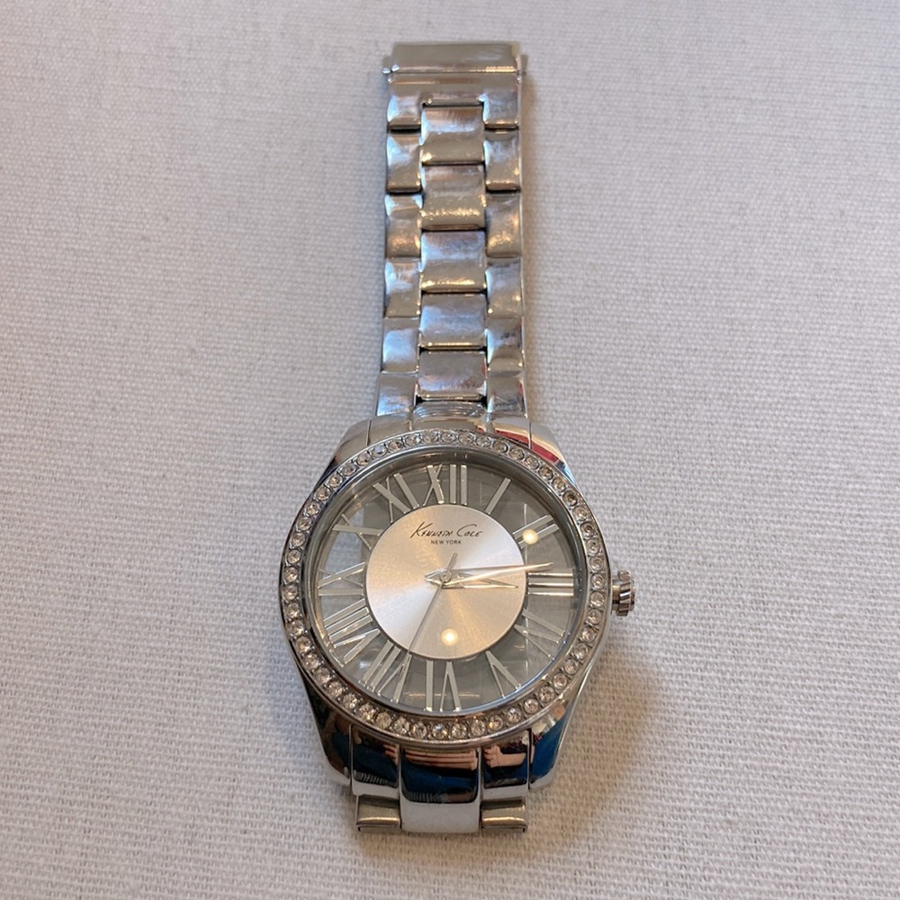 Silver Kenneth Cole watch. Needs battery. GUC